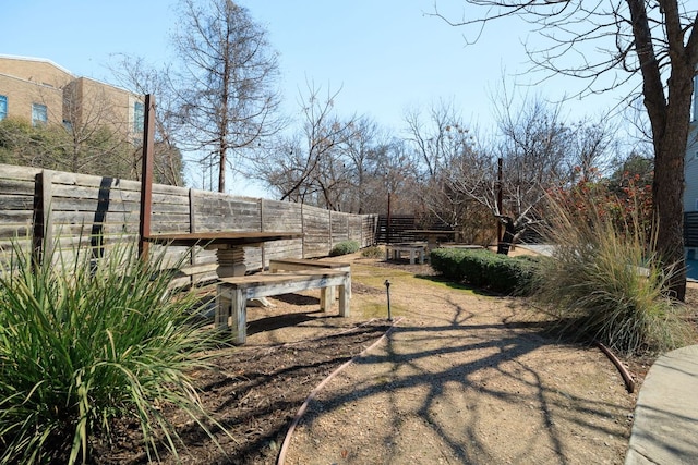 view of yard with fence