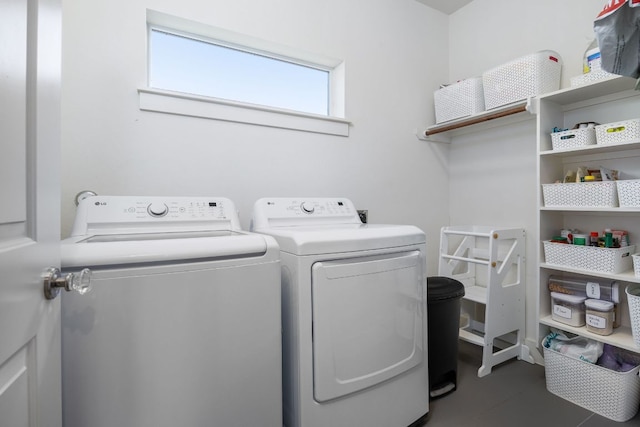 laundry area featuring laundry area and washing machine and clothes dryer