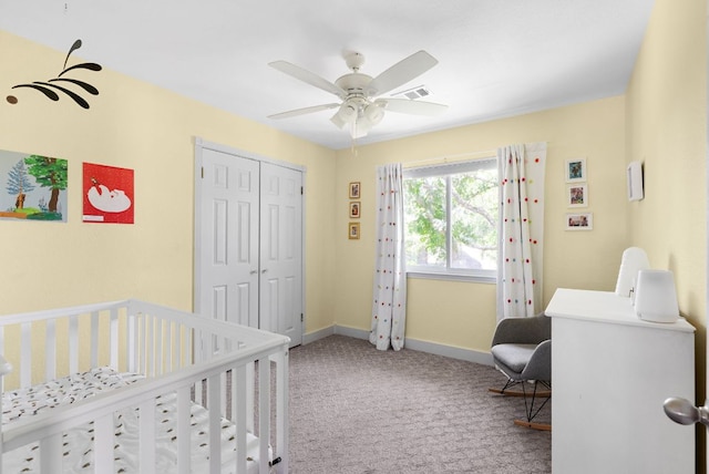 bedroom with visible vents, baseboards, a ceiling fan, carpet flooring, and a closet