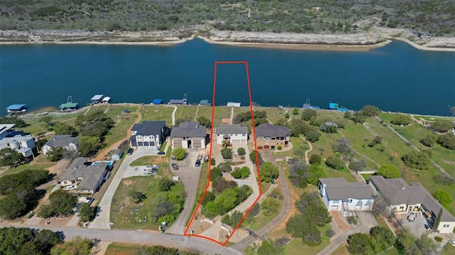 2802 Truman Cv, Lago Vista, TX 78645 - view of property location with a large body of water, nearby suburban area, and property boundaries highlighted