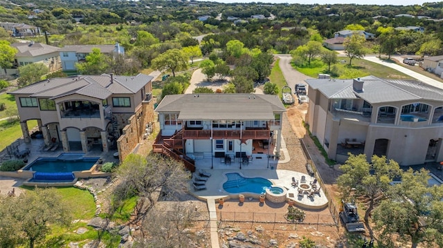 2802 Truman Cv, Lago Vista, TX 78645 - aerial perspective of suburban area with a pool area