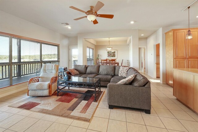 2802 Truman Cv, Lago Vista, TX 78645 - living room featuring light tile patterned floors, ceiling fan, and recessed lighting