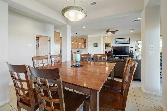 2802 Truman Cv, Lago Vista, TX 78645 - dining space featuring light tile patterned flooring, a ceiling fan, baseboards, and recessed lighting