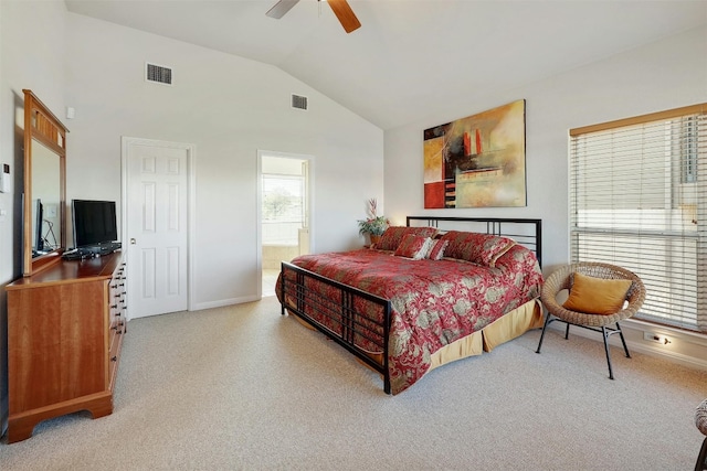 bedroom featuring visible vents, light carpet, and multiple windows