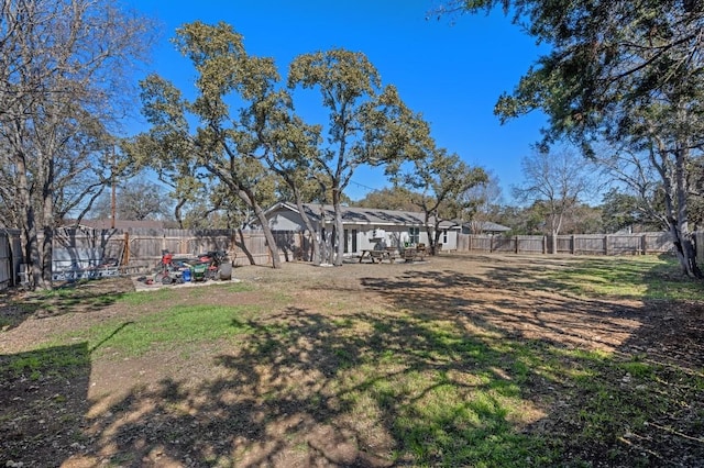 view of yard featuring a fenced backyard