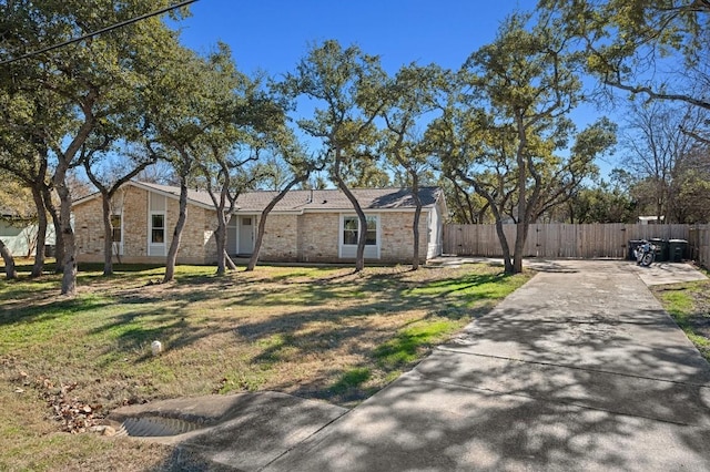 712 Ruby Isle Dr, Leander, TX 78641 - view of front of property with concrete driveway and brick siding