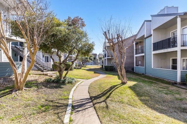 12166 Metric Blvd Unit 230, Austin, TX 78758 - view of community featuring a lawn and a residential view