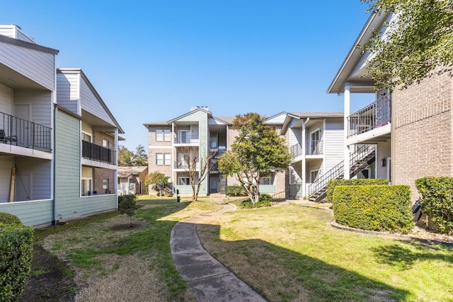12166 Metric Blvd Unit 230, Austin, TX 78758 - view of property's community with a lawn