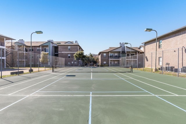 12166 Metric Blvd Unit 230, Austin, TX 78758 - view of tennis court featuring community basketball court