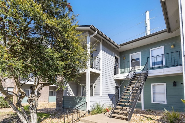 12166 Metric Blvd Unit 230, Austin, TX 78758 - view of building exterior with stairs