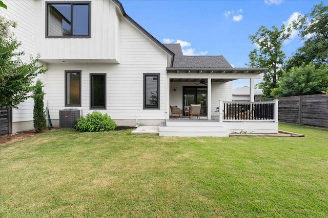 back of house with a yard, a patio, central AC, fence, and ceiling fan