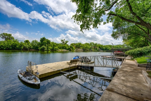 dock area featuring a water view