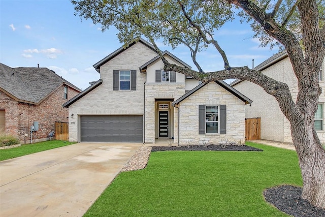 view of front of property with brick siding, concrete driveway, an attached garage, fence, and a front lawn