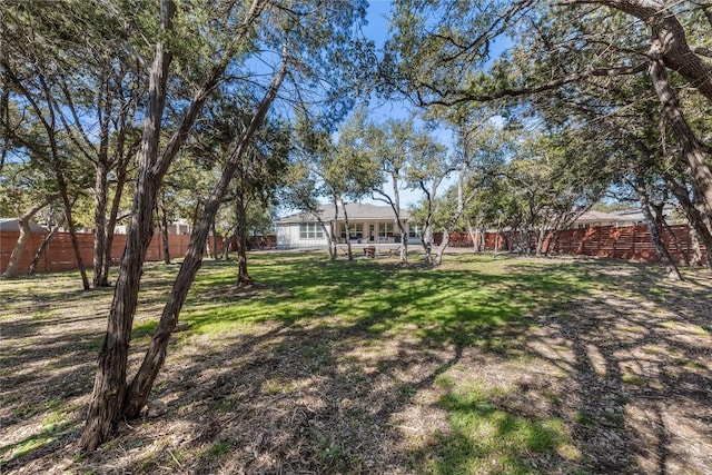 view of yard featuring a fenced backyard