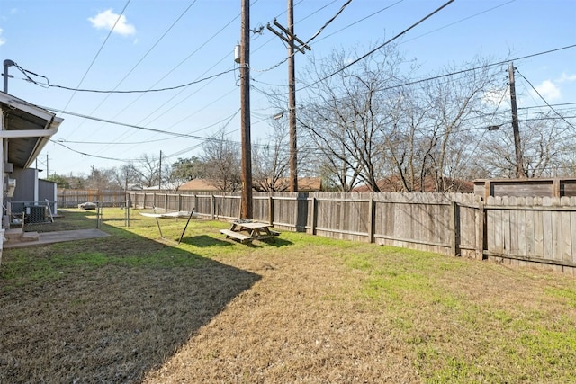 view of yard featuring a fenced backyard