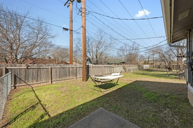 view of yard featuring a fenced backyard