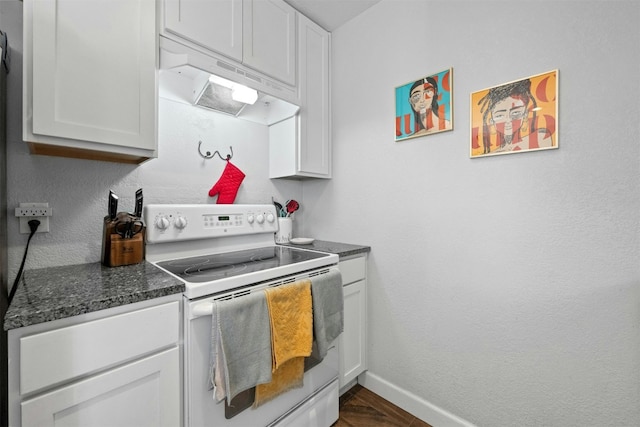 kitchen featuring a textured wall, under cabinet range hood, white cabinetry, baseboards, and white electric range oven