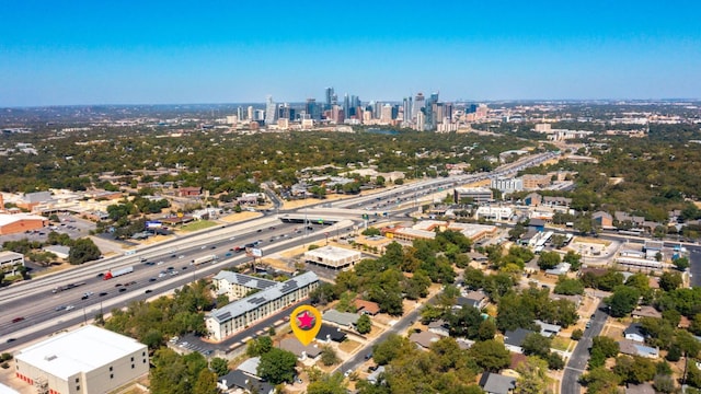 birds eye view of property featuring a view of city