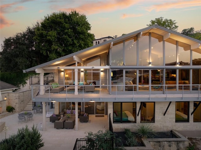 719 Cutlass St, Austin, TX 78734 - back of house with outdoor lounge area, a patio area, and stairway