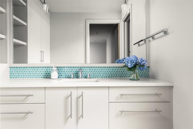 719 Cutlass St, Austin, TX 78734 - bathroom featuring tasteful backsplash and vanity