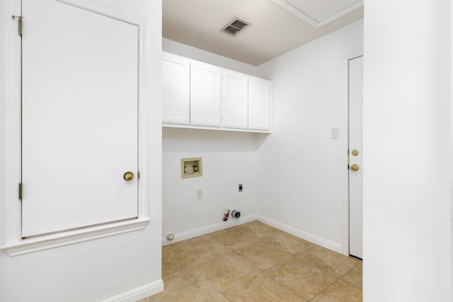 washroom featuring gas dryer hookup, hookup for a washing machine, visible vents, cabinet space, and electric dryer hookup