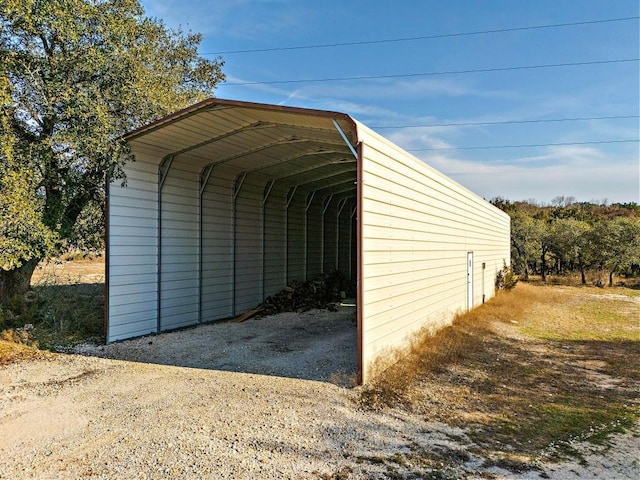 view of outbuilding featuring a detached carport