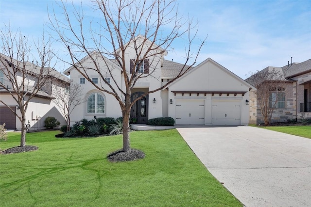 view of front of house featuring a garage, concrete driveway, a front yard, and stucco siding