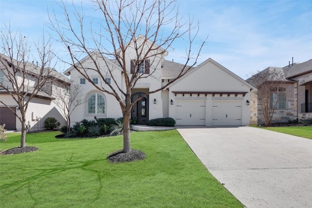 4104 Belisario Ct, Leander, TX 78641 - french country home featuring stucco siding, driveway, a front yard, and an attached garage