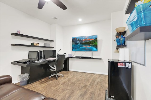 4104 Belisario Ct, Leander, TX 78641 - office featuring wood finished floors, a ceiling fan, and recessed lighting