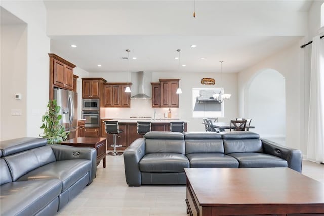 4104 Belisario Ct, Leander, TX 78641 - living room with arched walkways and recessed lighting