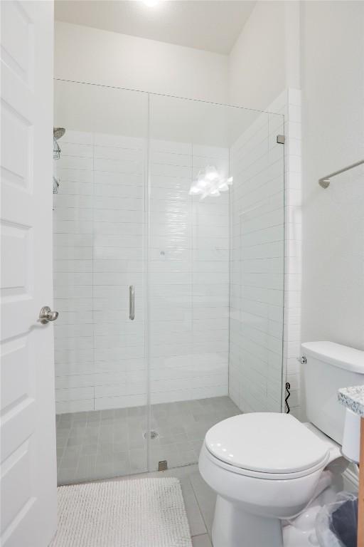 4104 Belisario Ct, Leander, TX 78641 - full bath with a stall shower and tile patterned flooring