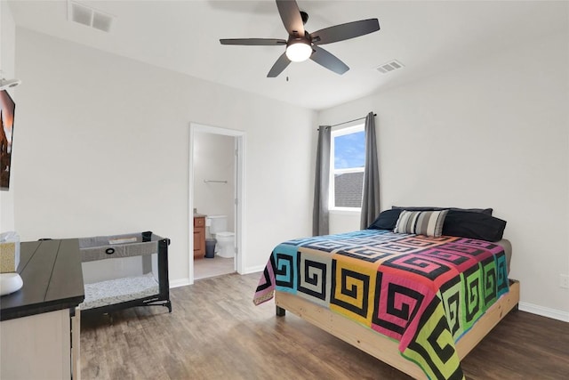 4104 Belisario Ct, Leander, TX 78641 - bedroom with wood finished floors, ensuite bathroom, and ceiling fan
