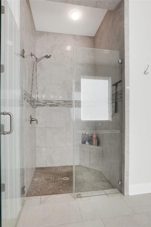 4104 Belisario Ct, Leander, TX 78641 - full bath featuring a stall shower and tile patterned floors