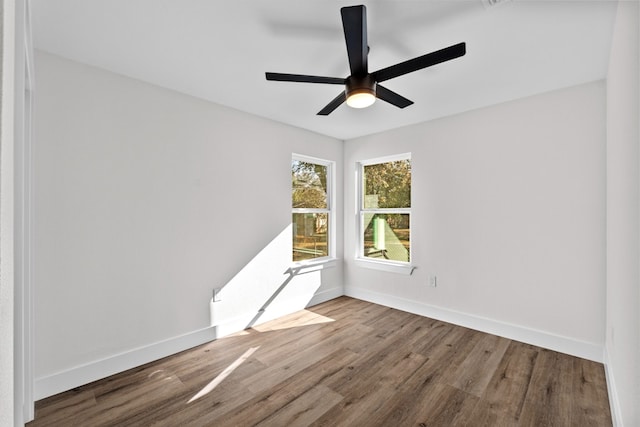 1520 Weyford Dr, Austin, TX 78757 - empty room with wood finished floors and ceiling fan