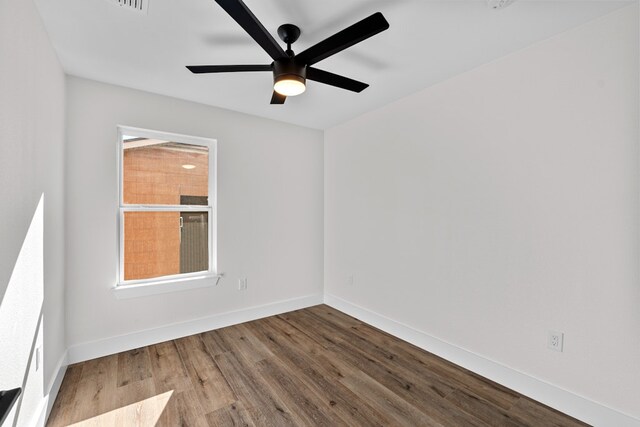1520 Weyford Dr, Austin, TX 78757 - unfurnished room with wood finished floors and ceiling fan