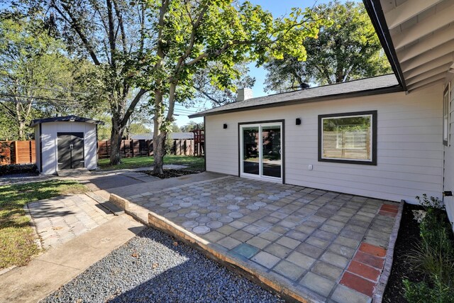 1520 Weyford Dr, Austin, TX 78757 - view of patio featuring a shed