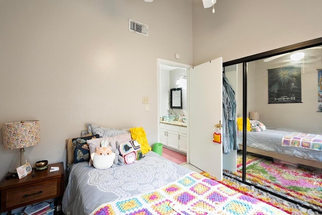 2210 Pearl St Unit 305, Austin, TX 78705 - bedroom with a closet and connected bathroom