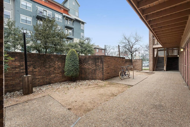2210 Pearl St Unit 305, Austin, TX 78705 - view of patio / terrace with stairs