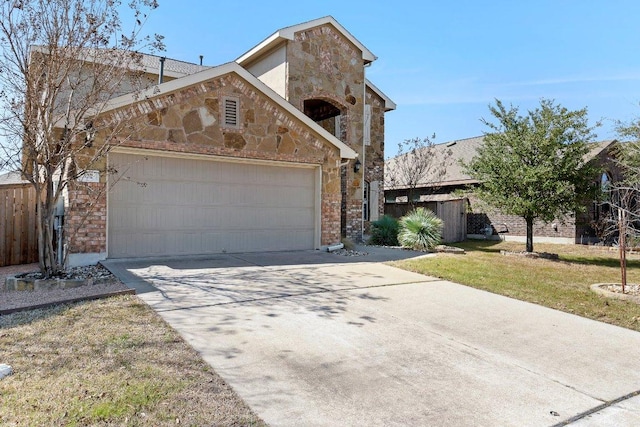 view of front facade featuring stone siding, an attached garage, fence, and driveway