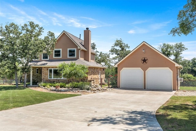 view of front of property featuring a front yard, fence, a chimney, and an outdoor structure