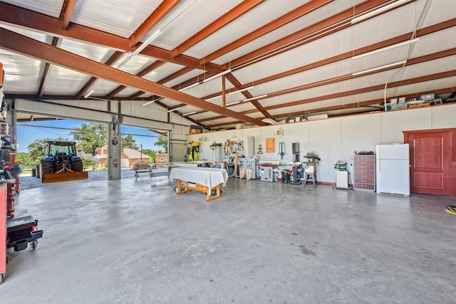 garage featuring freestanding refrigerator