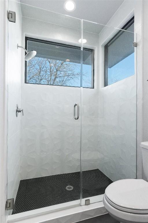 5403 Duval St Unit 2, Austin, TX 78751 - bathroom with a shower stall and toilet