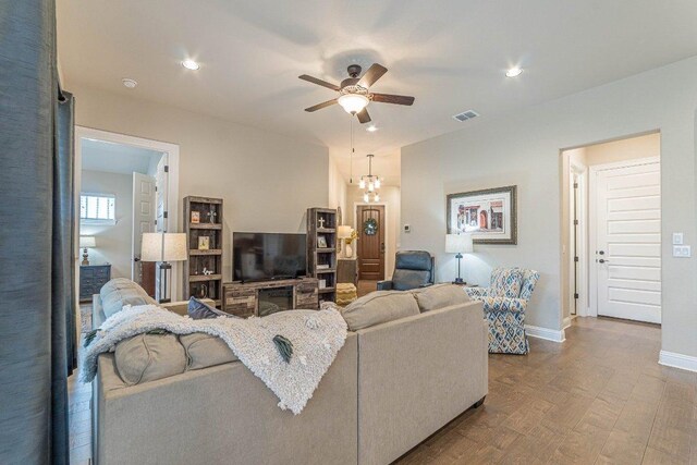 409 Flying Orchid Dr, San Marcos, TX 78666 - living area featuring a ceiling fan, wood finished floors, and recessed lighting