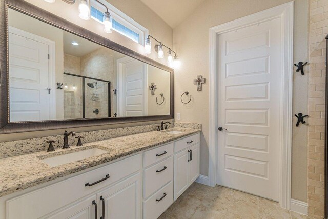 409 Flying Orchid Dr, San Marcos, TX 78666 - full bath featuring a stall shower and double vanity