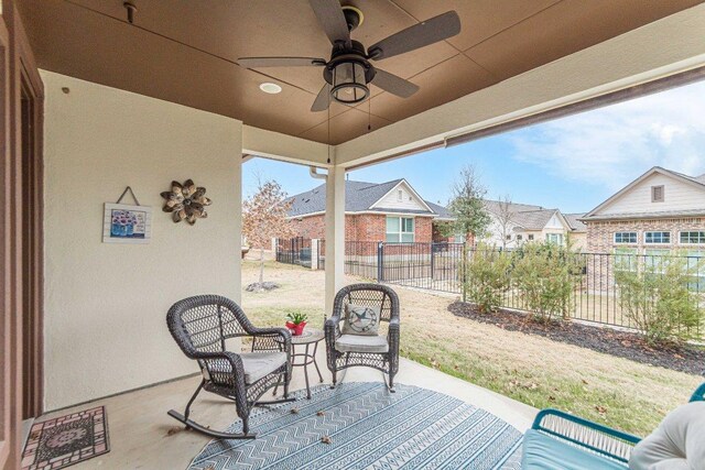 409 Flying Orchid Dr, San Marcos, TX 78666 - view of patio / terrace featuring a ceiling fan and a residential view