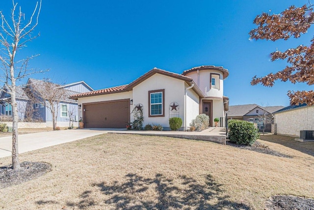 mediterranean / spanish home with a tile roof, stucco siding, central AC unit, a garage, and driveway