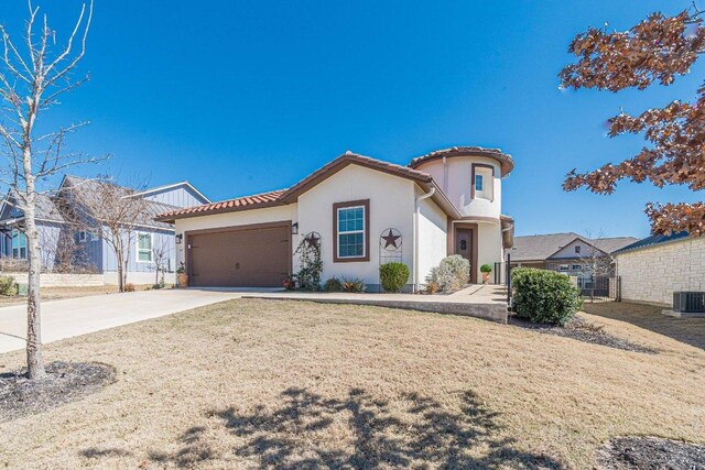 409 Flying Orchid Dr, San Marcos, TX 78666 - mediterranean / spanish-style house featuring a garage, stucco siding, driveway, a tile roof, and a front yard