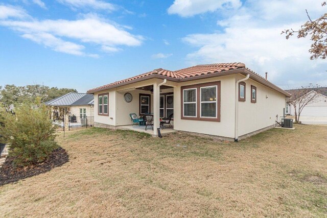 409 Flying Orchid Dr, San Marcos, TX 78666 - back of house featuring a patio area, stucco siding, and a tile roof