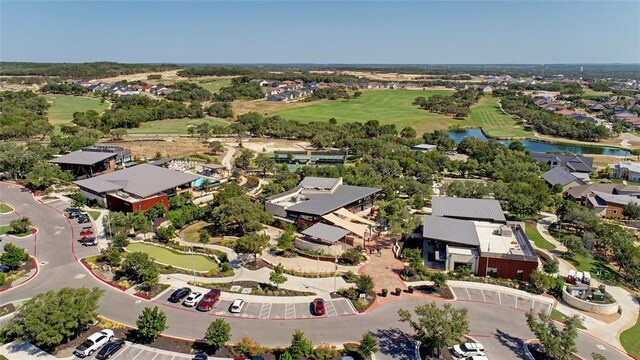 409 Flying Orchid Dr, San Marcos, TX 78666 - aerial view of residential area with a nearby body of water and a golf course