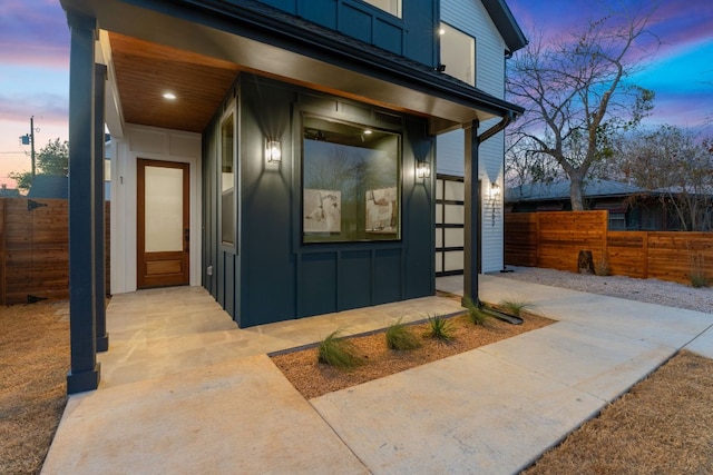 4402 Garnett St Unit 1, Austin, TX 78745 - view of exterior entry with board and batten siding